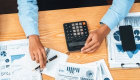 corporate-budget-executive-utilize-cuttingedge-business-intelligence-financial-data-dashboard-paper-meeting-table-accountant-auditor-team-examine-calculate-income-expense-meticulous