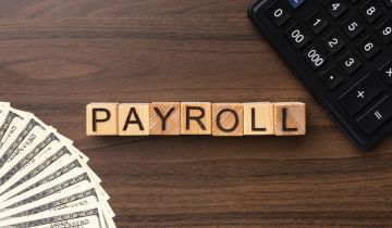 top-view-payroll-concept-with-cash-calculator